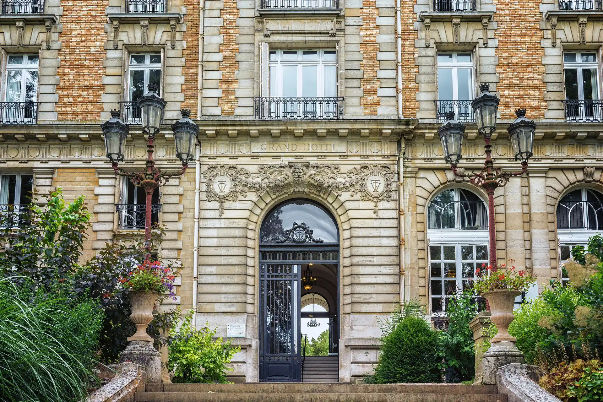 a very tall building with a big door